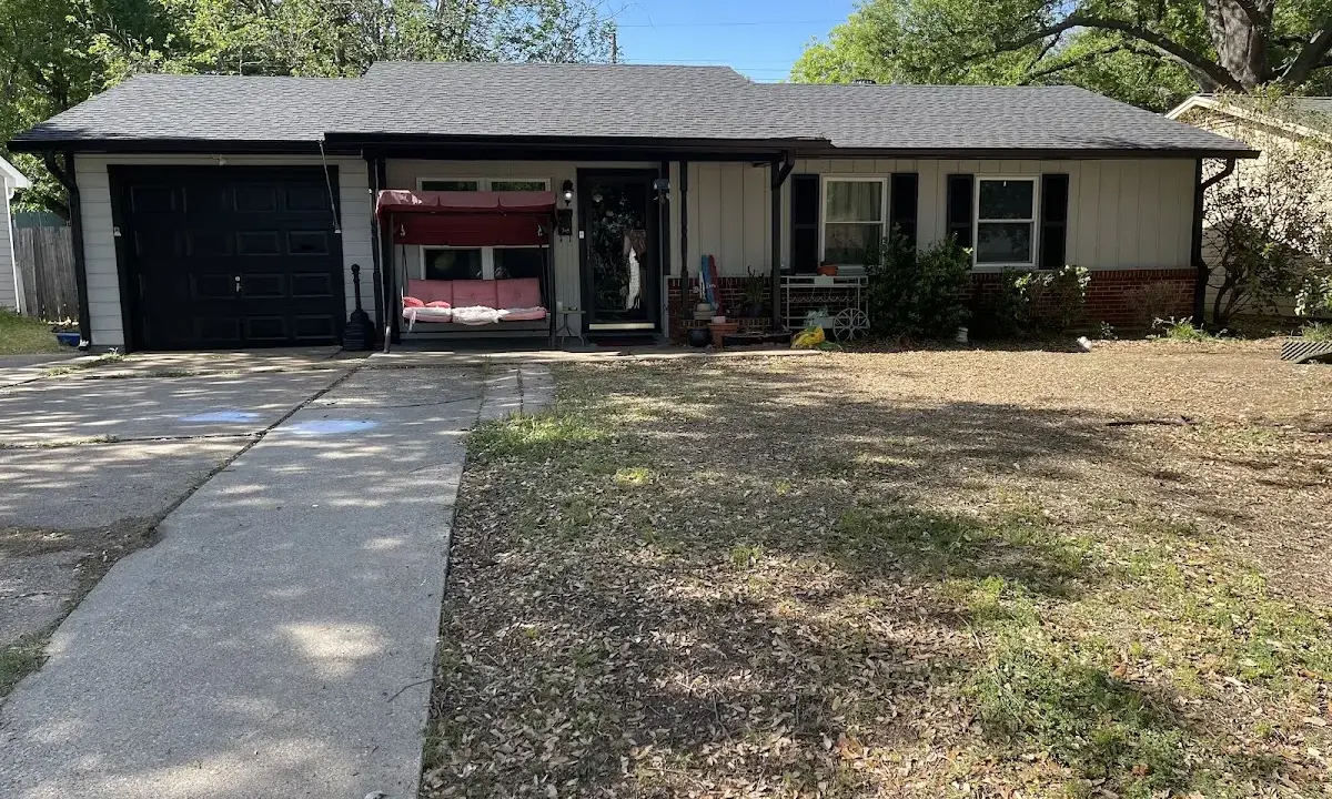 Hail Damage Roof Repair crew at work on a residential roof in Petal